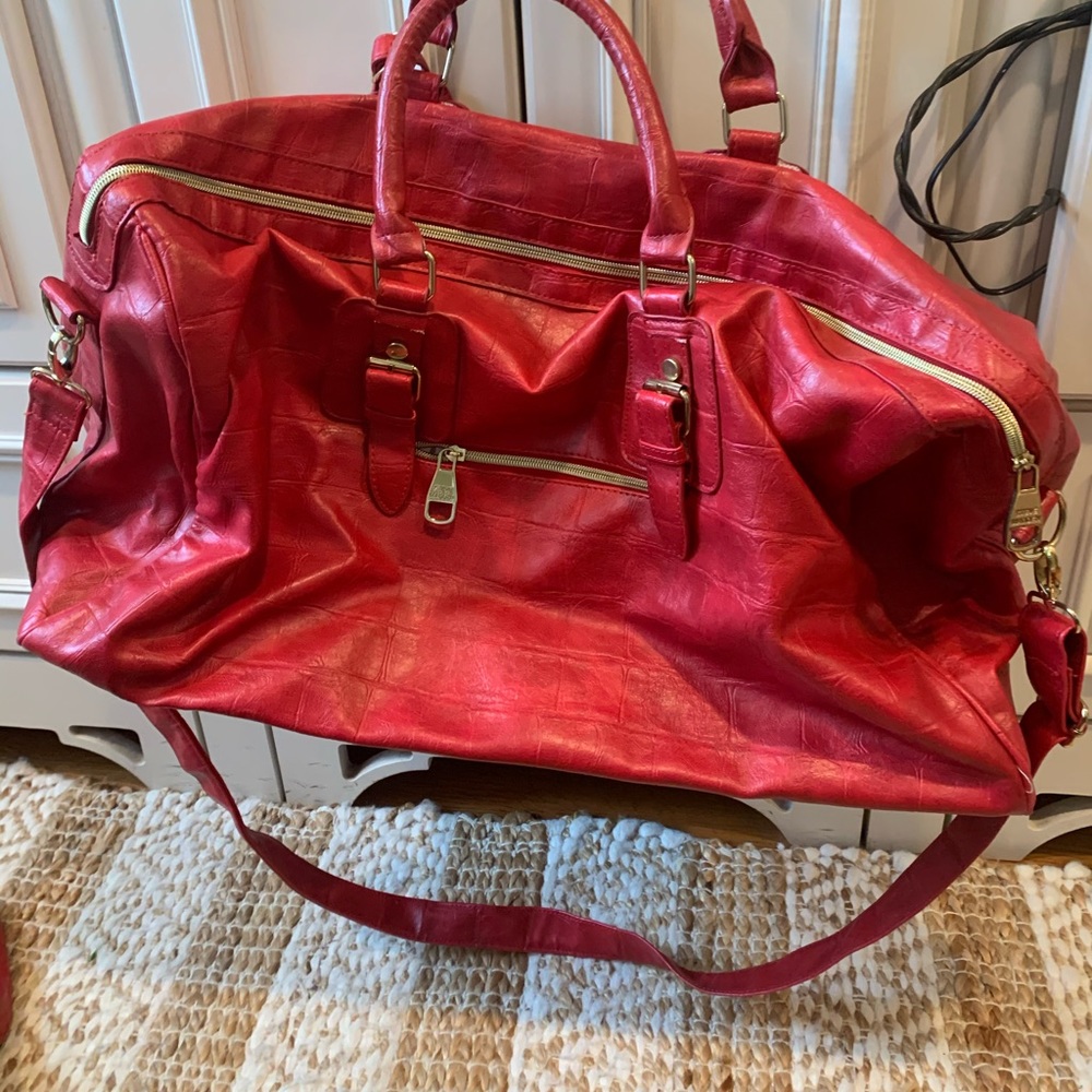 Red leather snakeskin Steve Madden travel bag!